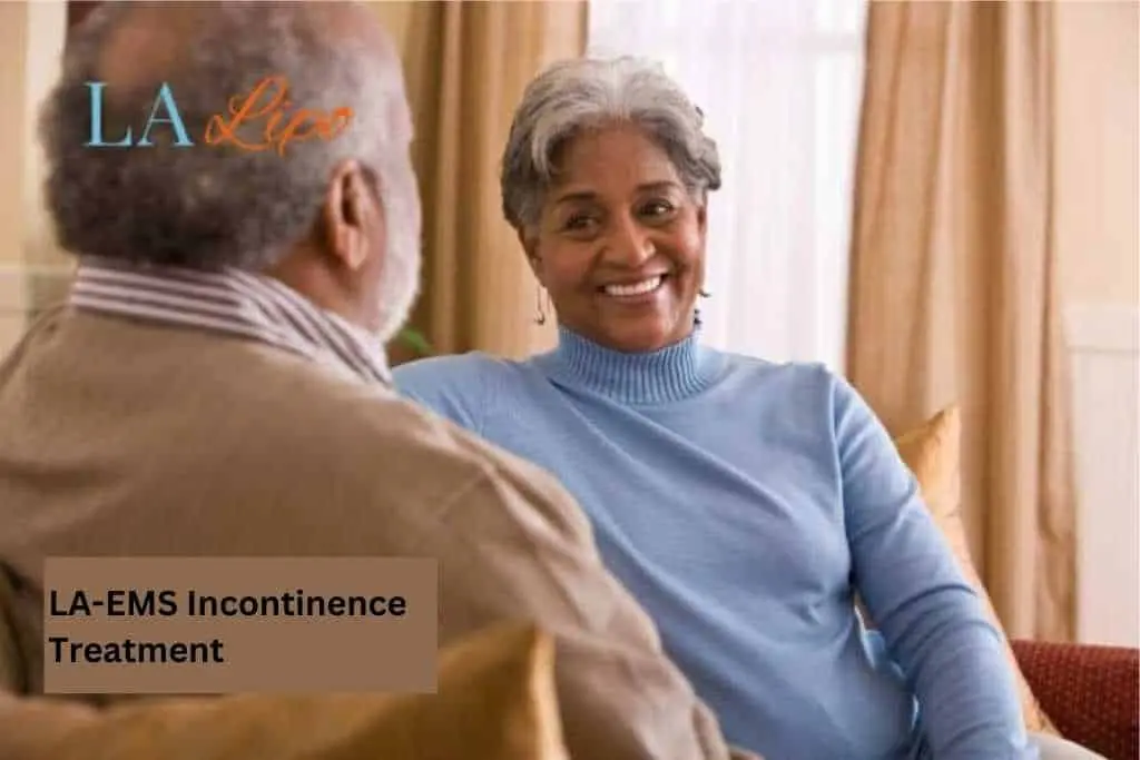 Couple sat smiling at each other - LA-EMS treatment Mansfield